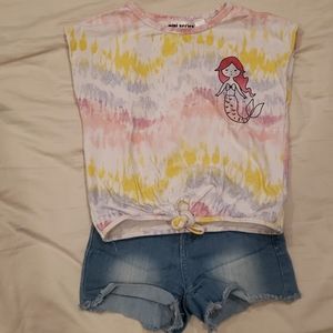 Mini series shirt . Celebrity pink shorts